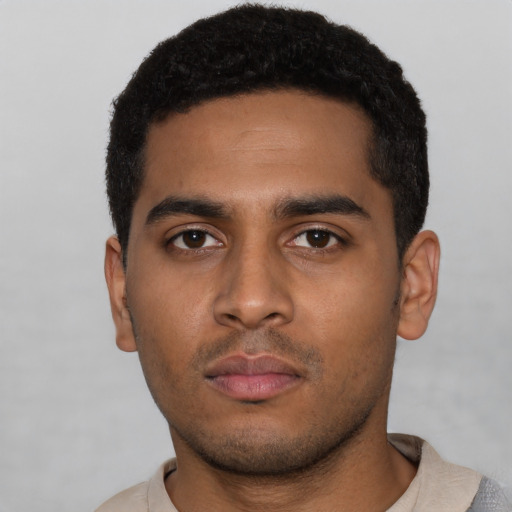 Neutral latino young-adult male with short  black hair and brown eyes
