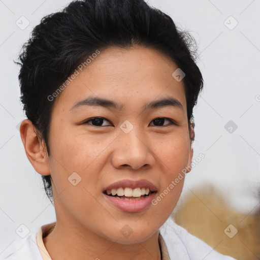 Joyful asian young-adult female with short  brown hair and brown eyes
