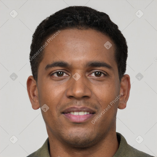 Joyful black young-adult male with short  black hair and brown eyes