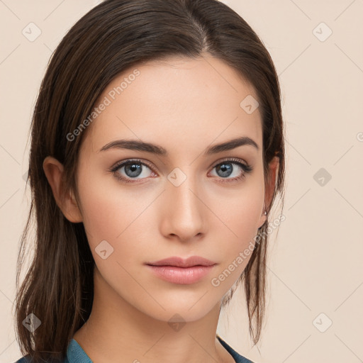 Neutral white young-adult female with long  brown hair and brown eyes