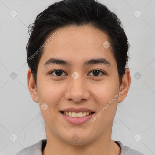 Joyful asian young-adult male with short  brown hair and brown eyes