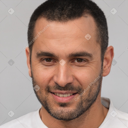 Joyful white young-adult male with short  brown hair and brown eyes