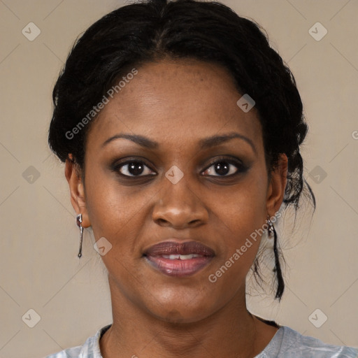 Joyful latino young-adult female with short  black hair and brown eyes