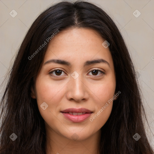 Joyful latino young-adult female with long  brown hair and brown eyes