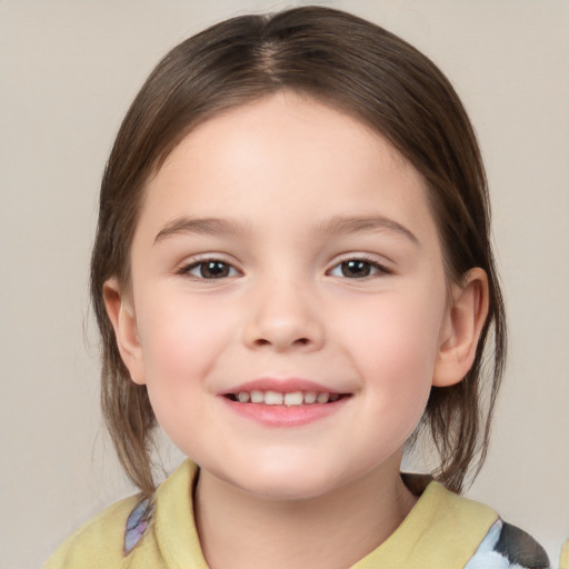 Joyful white child female with medium  brown hair and brown eyes