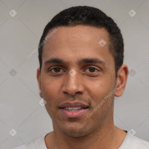 Joyful white young-adult male with short  black hair and brown eyes