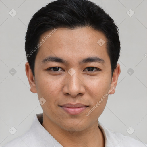 Joyful asian young-adult male with short  black hair and brown eyes