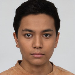 Neutral asian young-adult male with short  brown hair and brown eyes