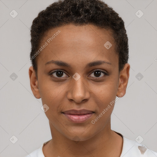 Joyful black young-adult female with short  brown hair and brown eyes