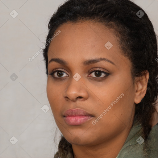 Neutral black young-adult female with long  brown hair and brown eyes