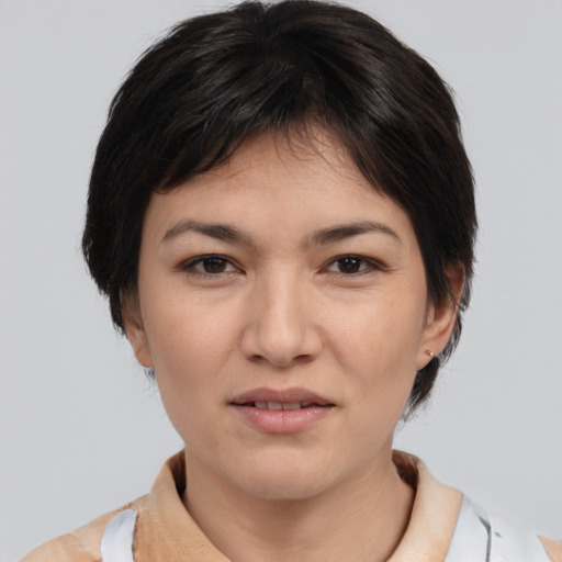 Joyful white young-adult female with medium  brown hair and brown eyes