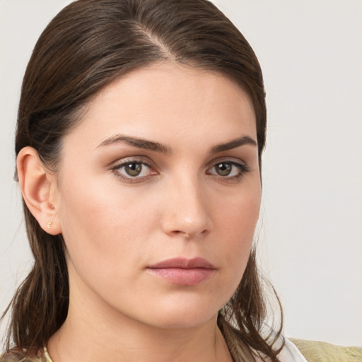 Neutral white young-adult female with medium  brown hair and brown eyes