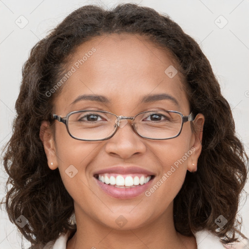 Joyful white adult female with medium  brown hair and brown eyes