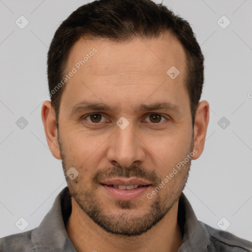 Joyful white adult male with short  brown hair and brown eyes