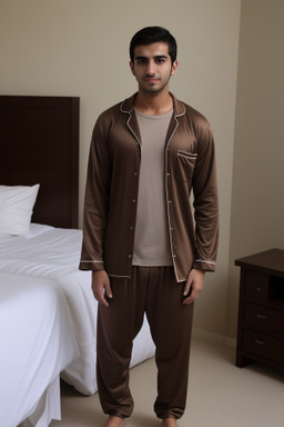 Emirati young adult male with  brown hair