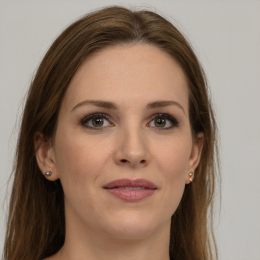 Joyful white young-adult female with long  brown hair and grey eyes