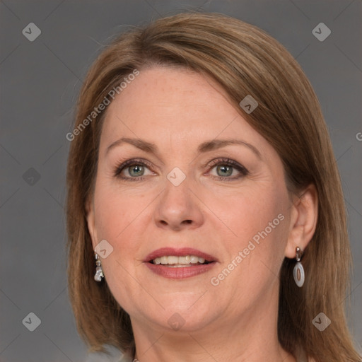 Joyful white adult female with medium  brown hair and grey eyes