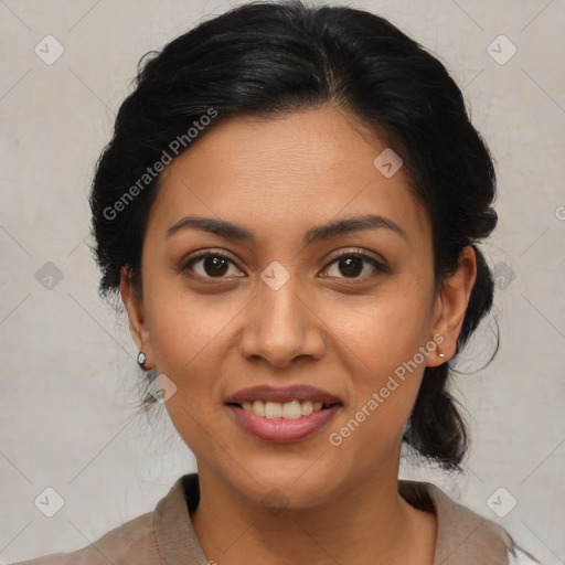 Joyful latino young-adult female with medium  brown hair and brown eyes