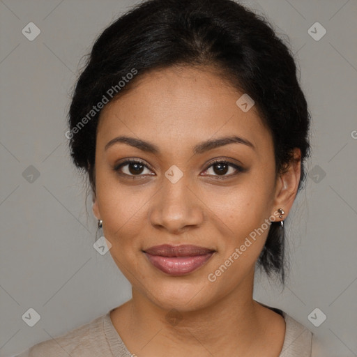 Joyful black young-adult female with medium  black hair and brown eyes