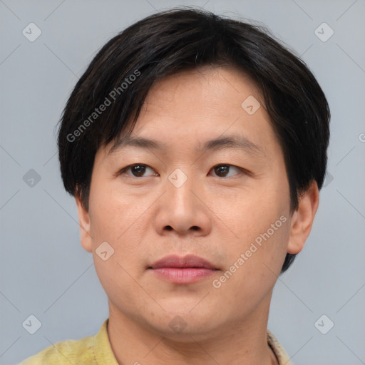 Neutral asian young-adult male with short  brown hair and brown eyes