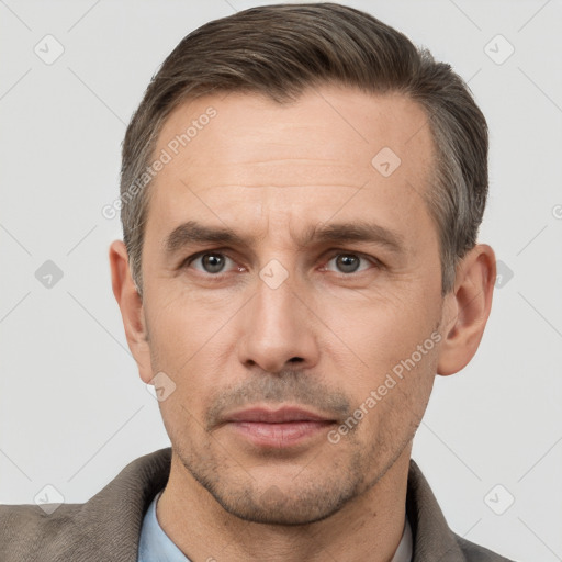 Neutral white adult male with short  brown hair and brown eyes