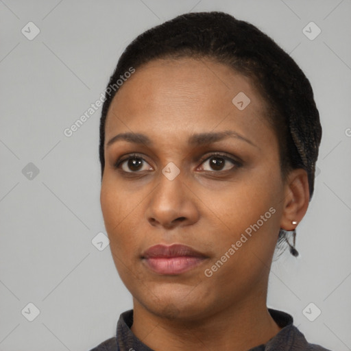 Neutral black young-adult female with short  black hair and brown eyes