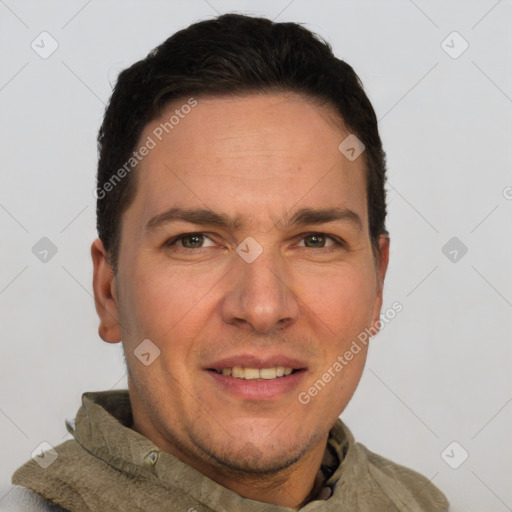 Joyful white adult male with short  brown hair and grey eyes