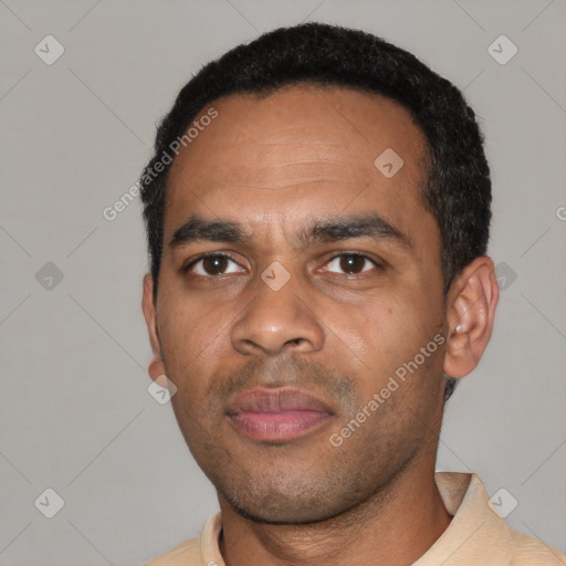 Neutral black young-adult male with short  black hair and brown eyes