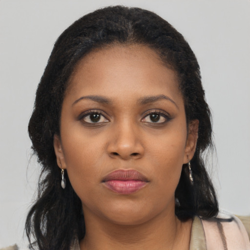 Neutral black young-adult female with long  black hair and brown eyes