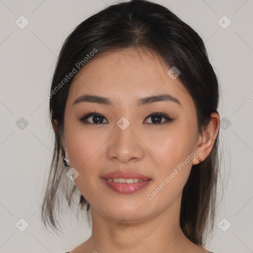 Joyful asian young-adult female with medium  brown hair and brown eyes