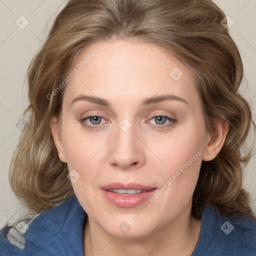 Joyful white young-adult female with medium  brown hair and blue eyes