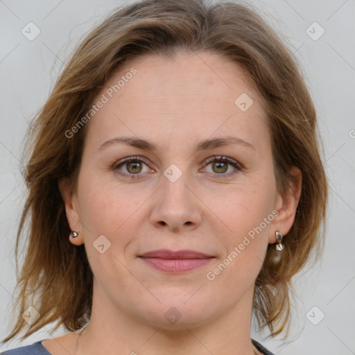 Joyful white young-adult female with medium  brown hair and blue eyes