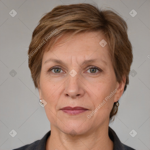 Joyful white adult female with short  brown hair and grey eyes