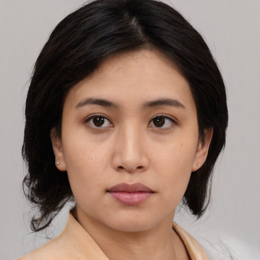 Neutral asian young-adult female with medium  black hair and brown eyes