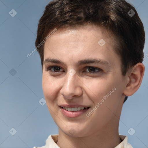 Joyful white young-adult female with short  brown hair and brown eyes