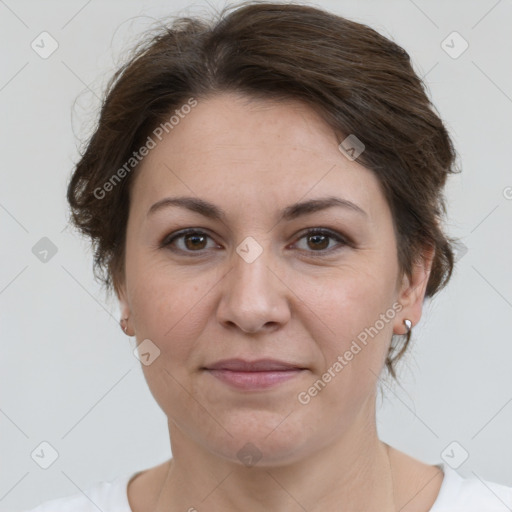 Joyful white adult female with short  brown hair and brown eyes