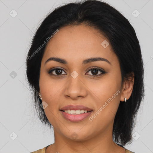 Joyful latino young-adult female with medium  black hair and brown eyes