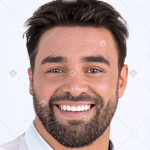 Joyful white young-adult male with short  black hair and brown eyes