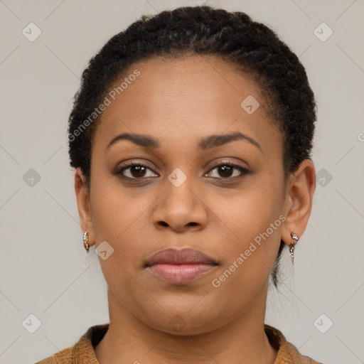 Joyful black young-adult female with short  brown hair and brown eyes