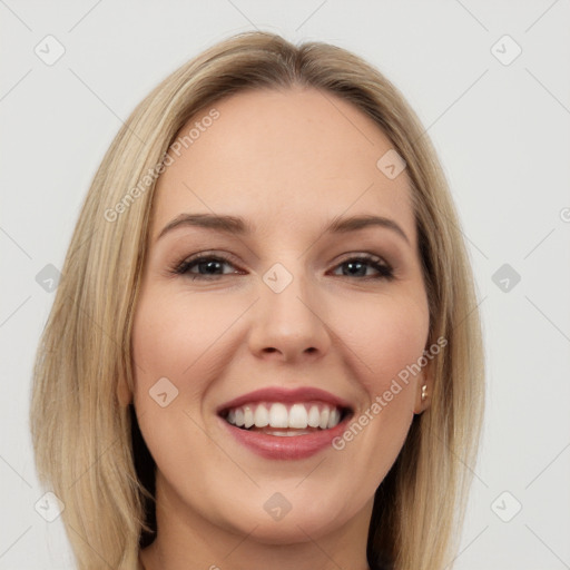 Joyful white young-adult female with long  brown hair and brown eyes