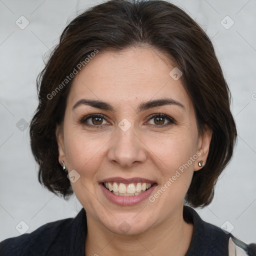 Joyful white adult female with medium  brown hair and brown eyes