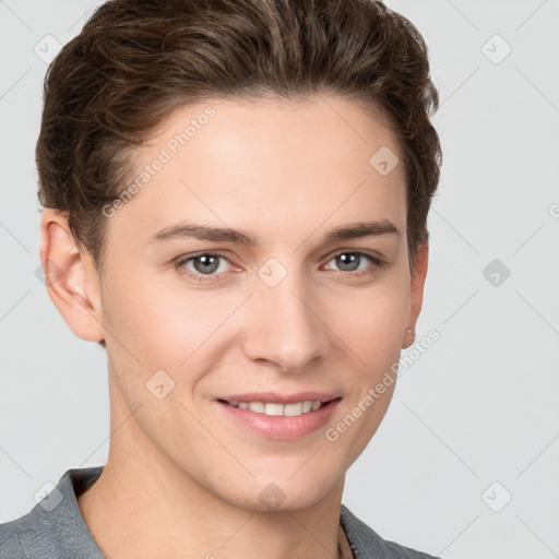 Joyful white young-adult female with short  brown hair and grey eyes