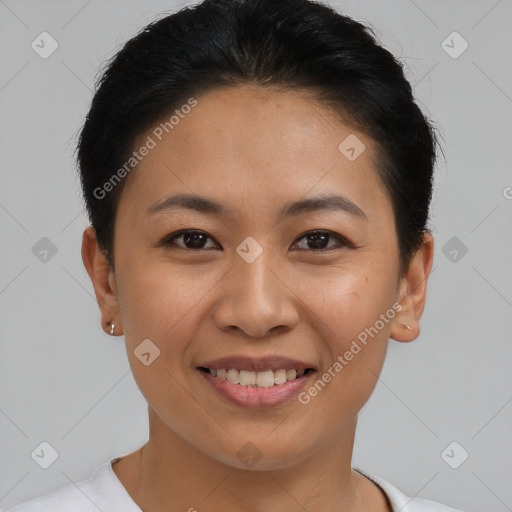 Joyful asian young-adult female with short  brown hair and brown eyes