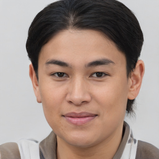 Joyful asian young-adult female with medium  brown hair and brown eyes