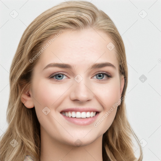 Joyful white young-adult female with long  brown hair and blue eyes