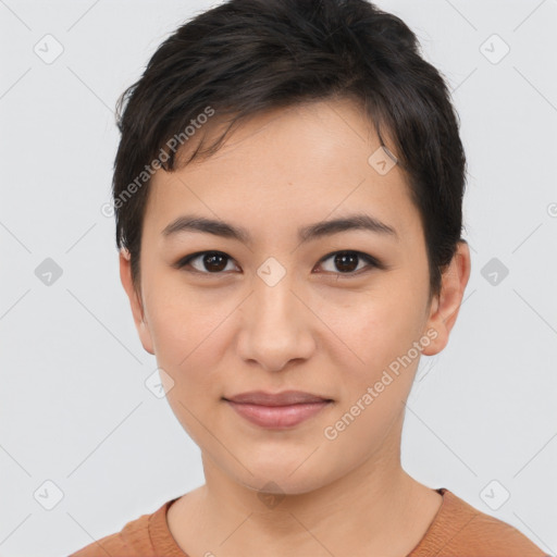 Joyful asian young-adult female with short  brown hair and brown eyes