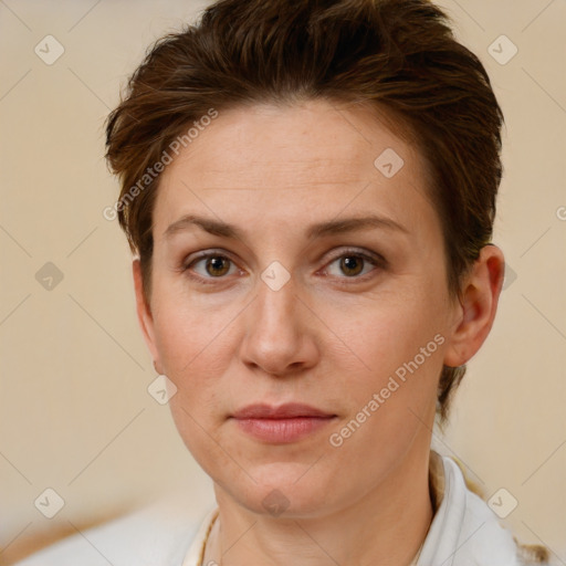 Joyful white adult female with short  brown hair and brown eyes