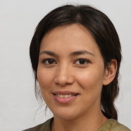 Joyful white young-adult female with medium  brown hair and brown eyes