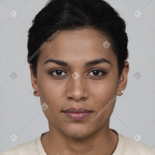 Joyful latino young-adult female with short  black hair and brown eyes