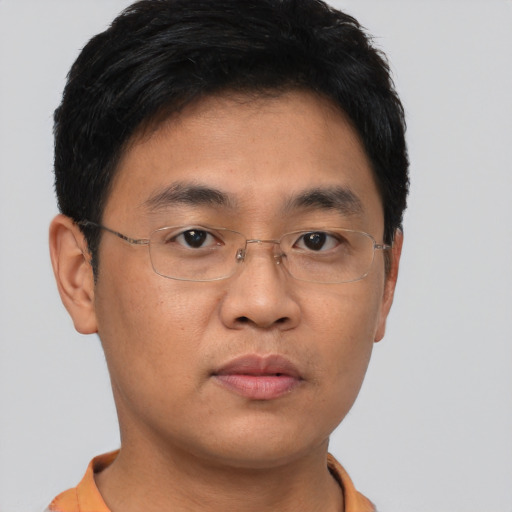Neutral asian young-adult male with short  brown hair and brown eyes